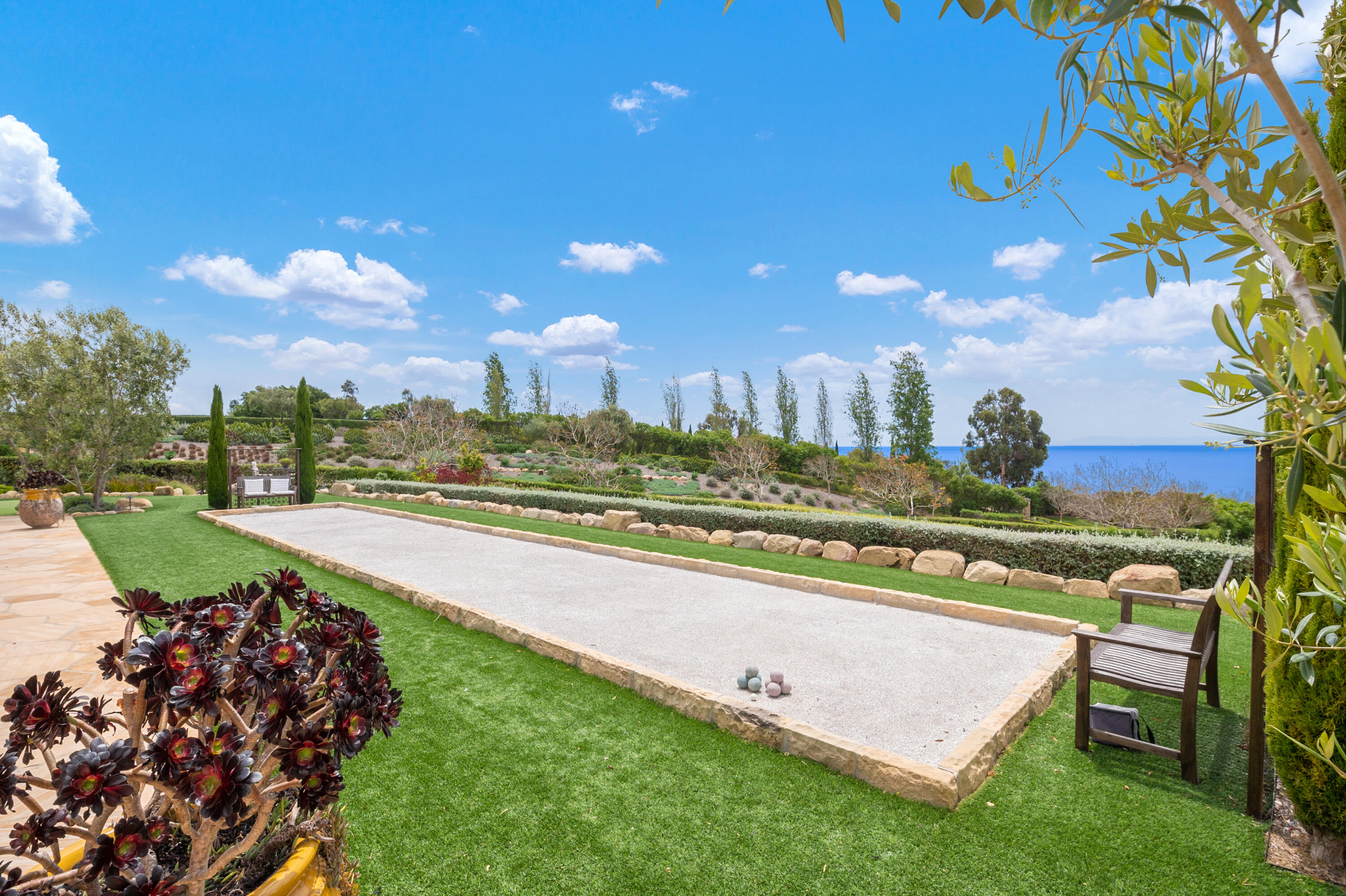 130 Montecito Ranch Lane Summerland, CA 93067 - Photo 25 of 33 a view of a lake with a building in the background