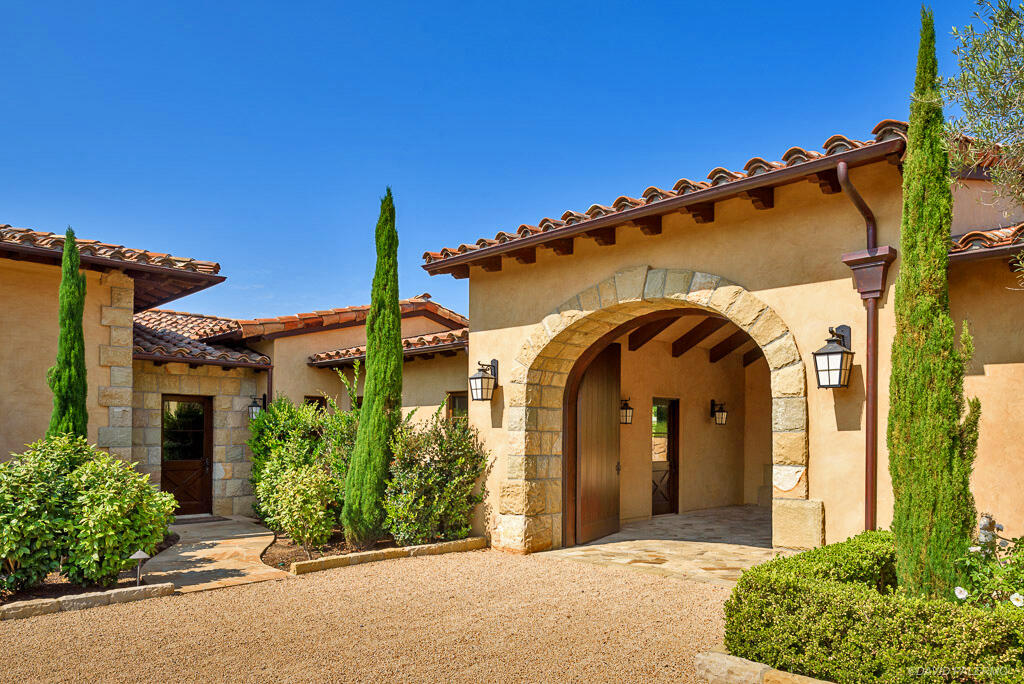 130 Montecito Ranch Lane Summerland, CA 93067 - Photo 27 of 33 front view of a house with a small yard