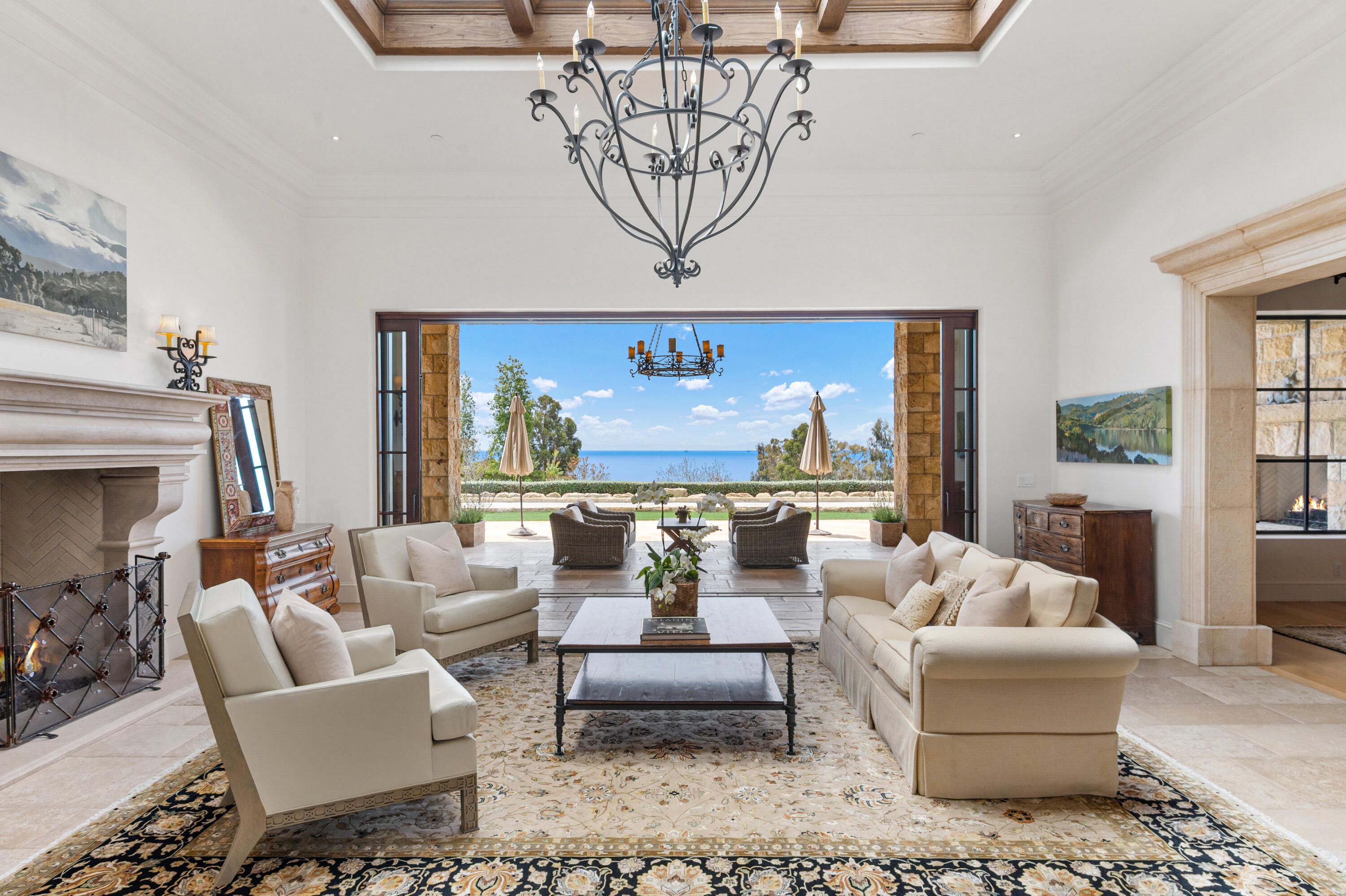 130 Montecito Ranch Lane Summerland, CA 93067 - Photo 7 of 33 a living room with furniture and a chandelier