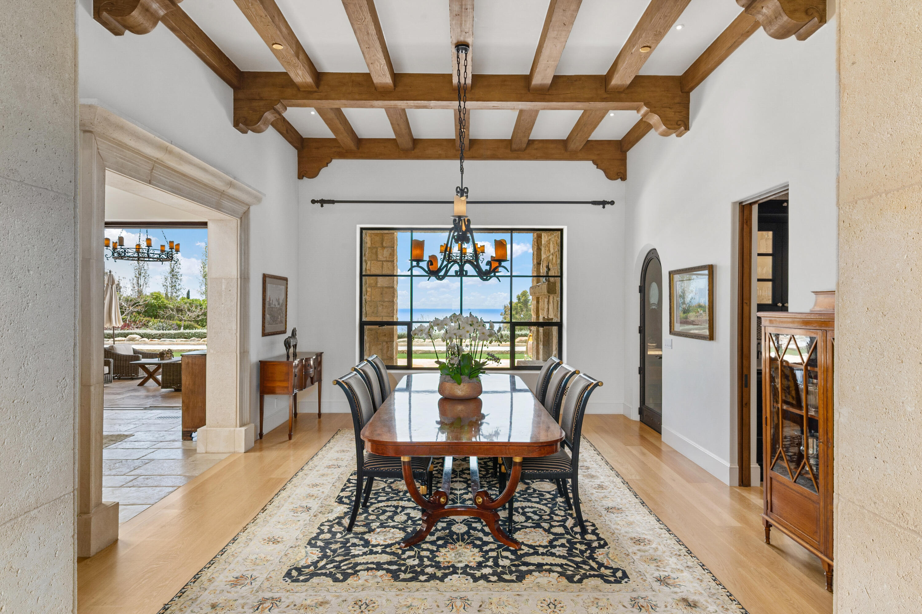 130 Montecito Ranch Lane Summerland, CA 93067 - Photo 8 of 33 a view of a dining room with furniture wooden floor and a chandelier