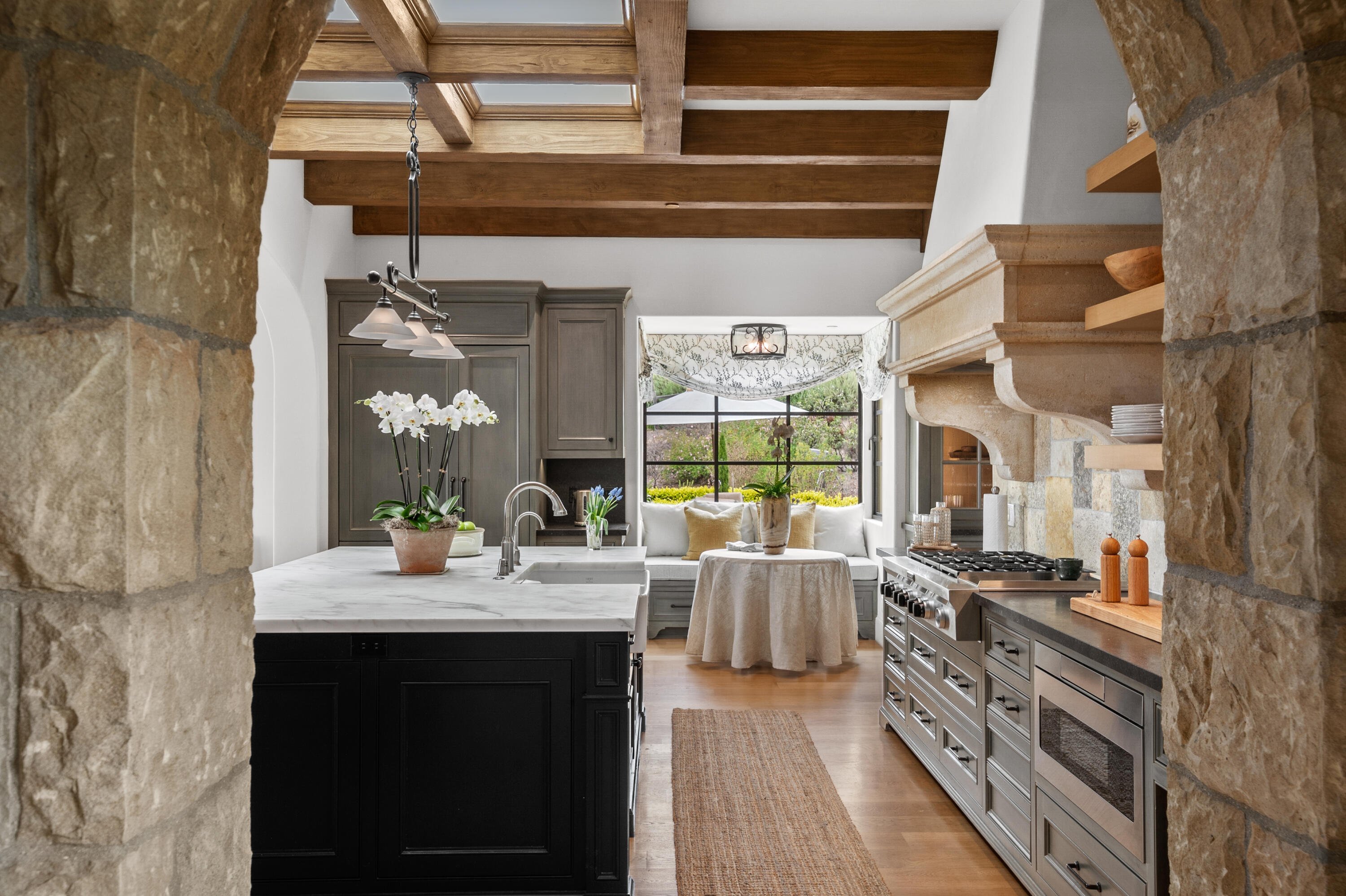 130 Montecito Ranch Lane Summerland, CA 93067 - Photo 10 of 33 a kitchen with a sink appliances cabinets and a large window