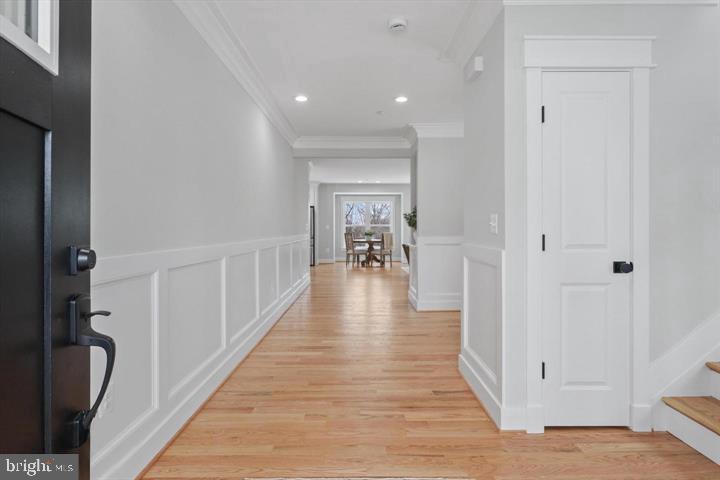 2806 Norbeck Road Silver Spring, MD 20906 - Photo 13 of 36 wooden floor with a chandelier