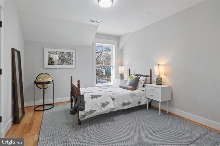2806 Norbeck Road Silver Spring, MD 20906 - Photo 20 of 36 a bedroom with bed and a window