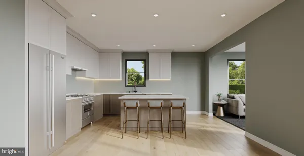 a kitchen with a table and chairs
