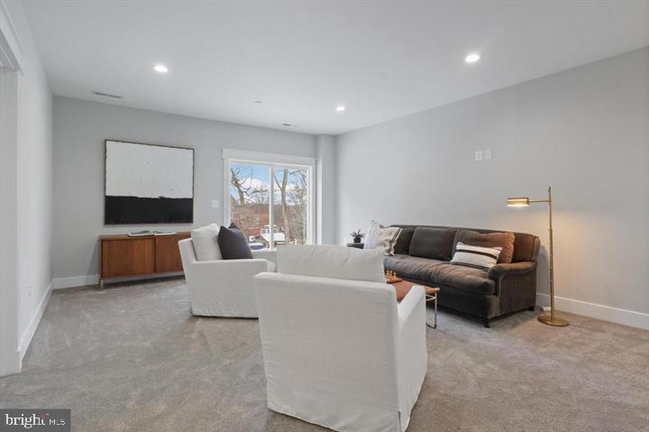 2806 Norbeck Road Silver Spring, MD 20906 - Photo 26 of 36 a living room with furniture and a flat screen tv