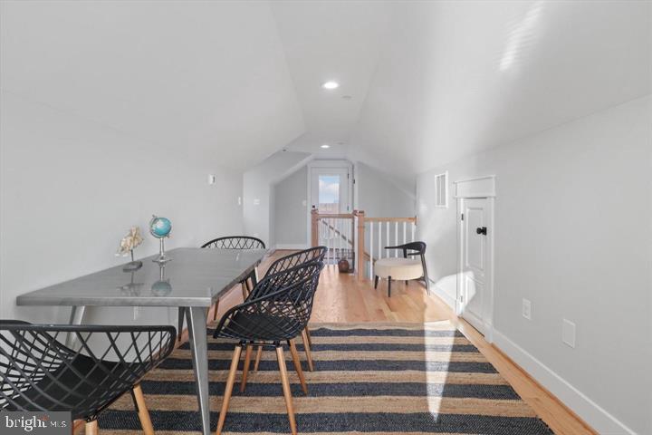 2806 Norbeck Road Silver Spring, MD 20906 - Photo 27 of 36 a view of a dining room with furniture and wooden floor