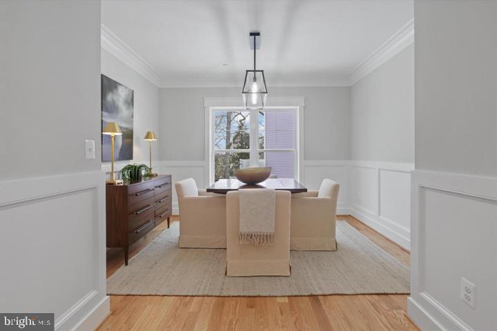 2806 Norbeck Road Silver Spring, MD 20906 - Photo 5 of 36 a living room with furniture a window and a dining table