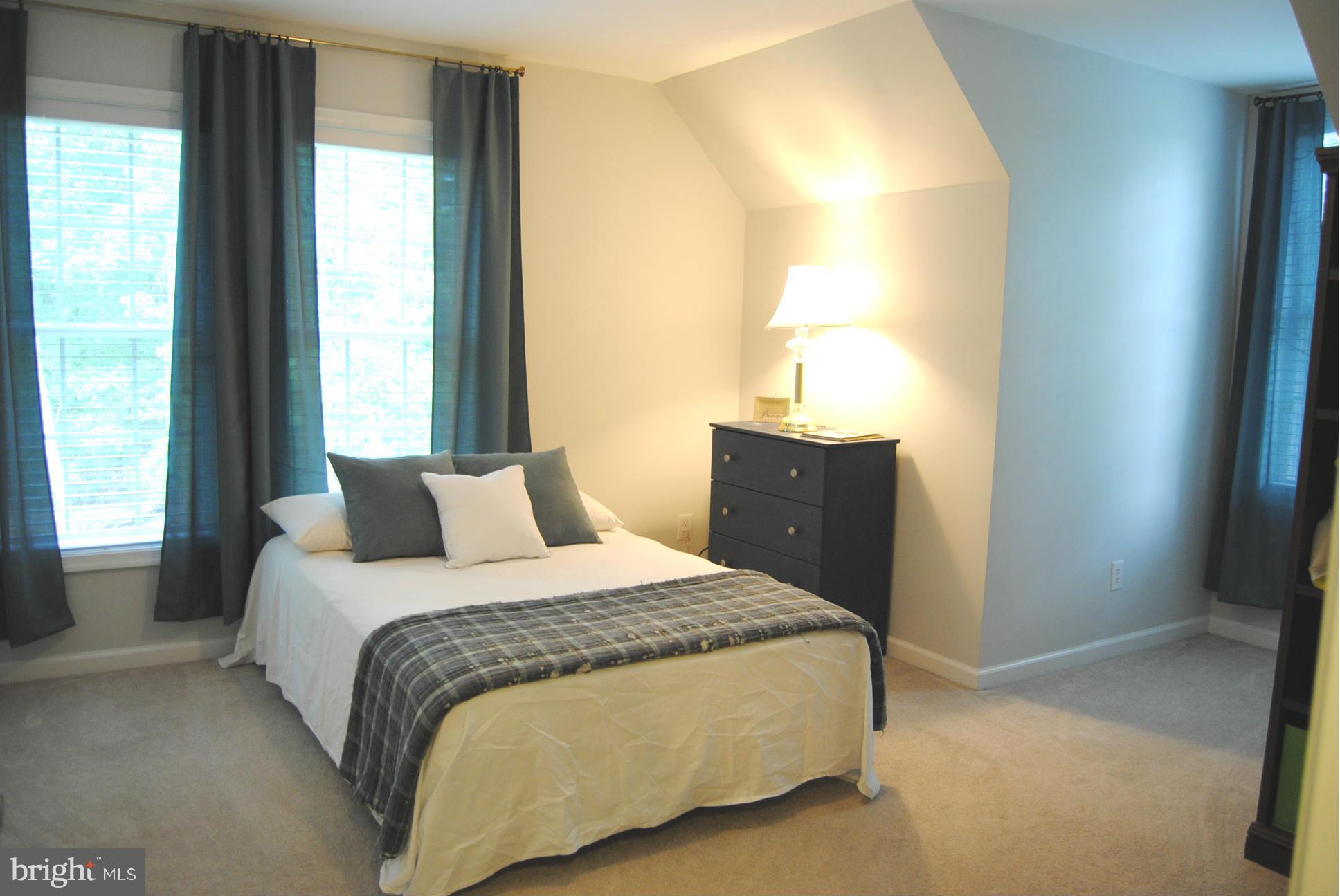 262 Nottingham Road Elkton, MD 21921 - Photo 14 of 23 a bedroom with a bed and wooden floor