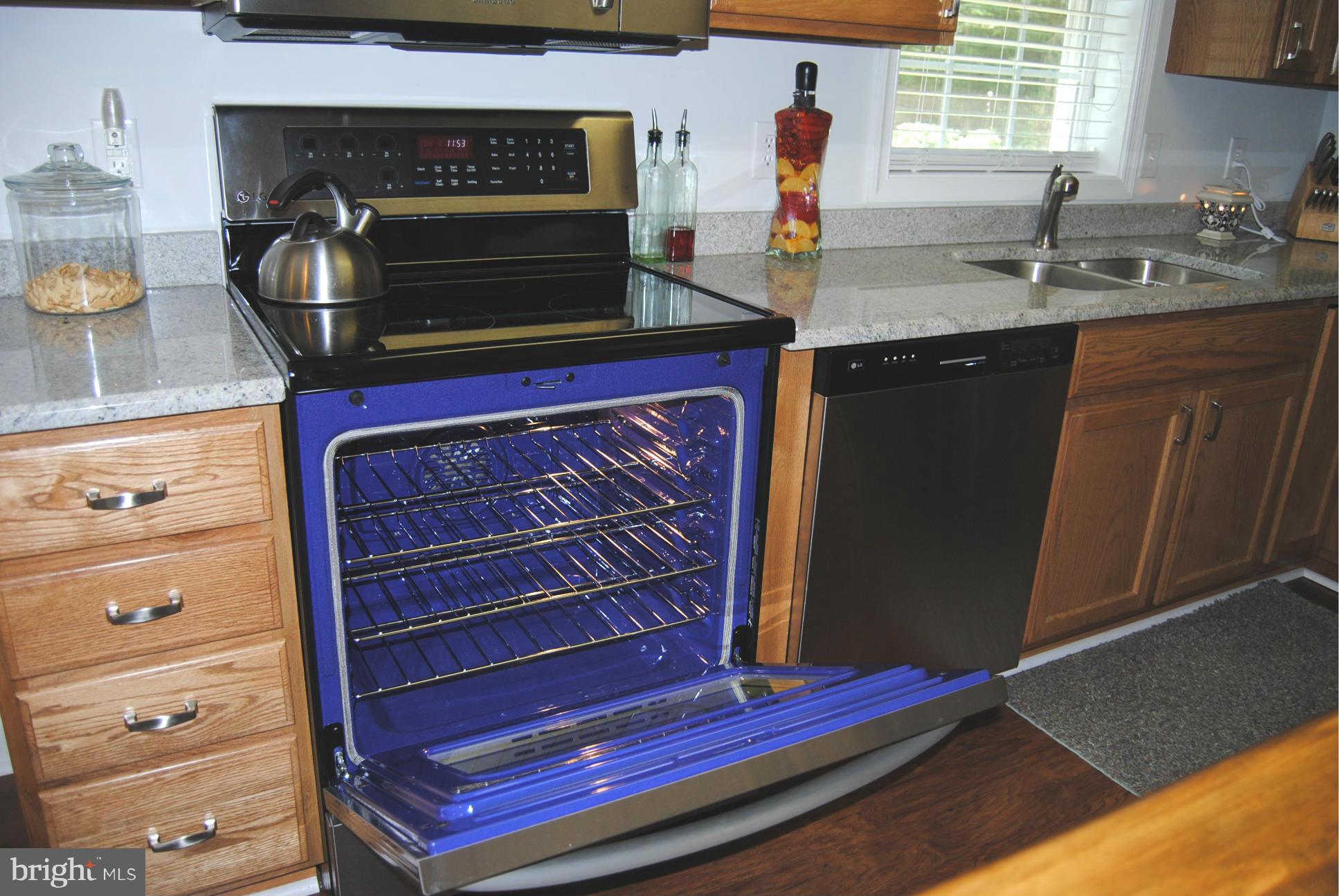 262 Nottingham Road Elkton, MD 21921 - Photo 8 of 23 a kitchen with a stove and cabinets