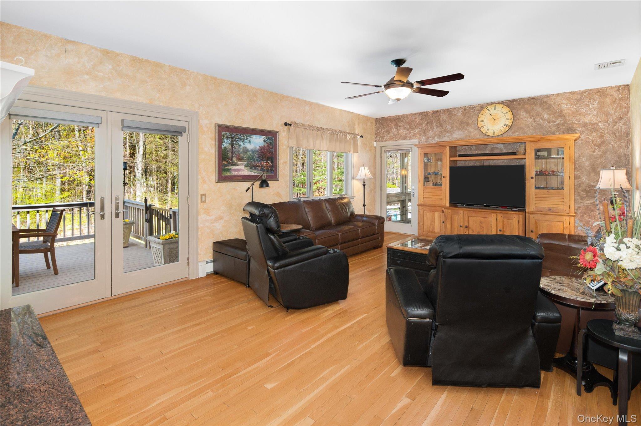 85 Orchard Hill Road Carmel, NY 10512 - Photo 16 of 50 a living room with furniture and a flat screen tv
