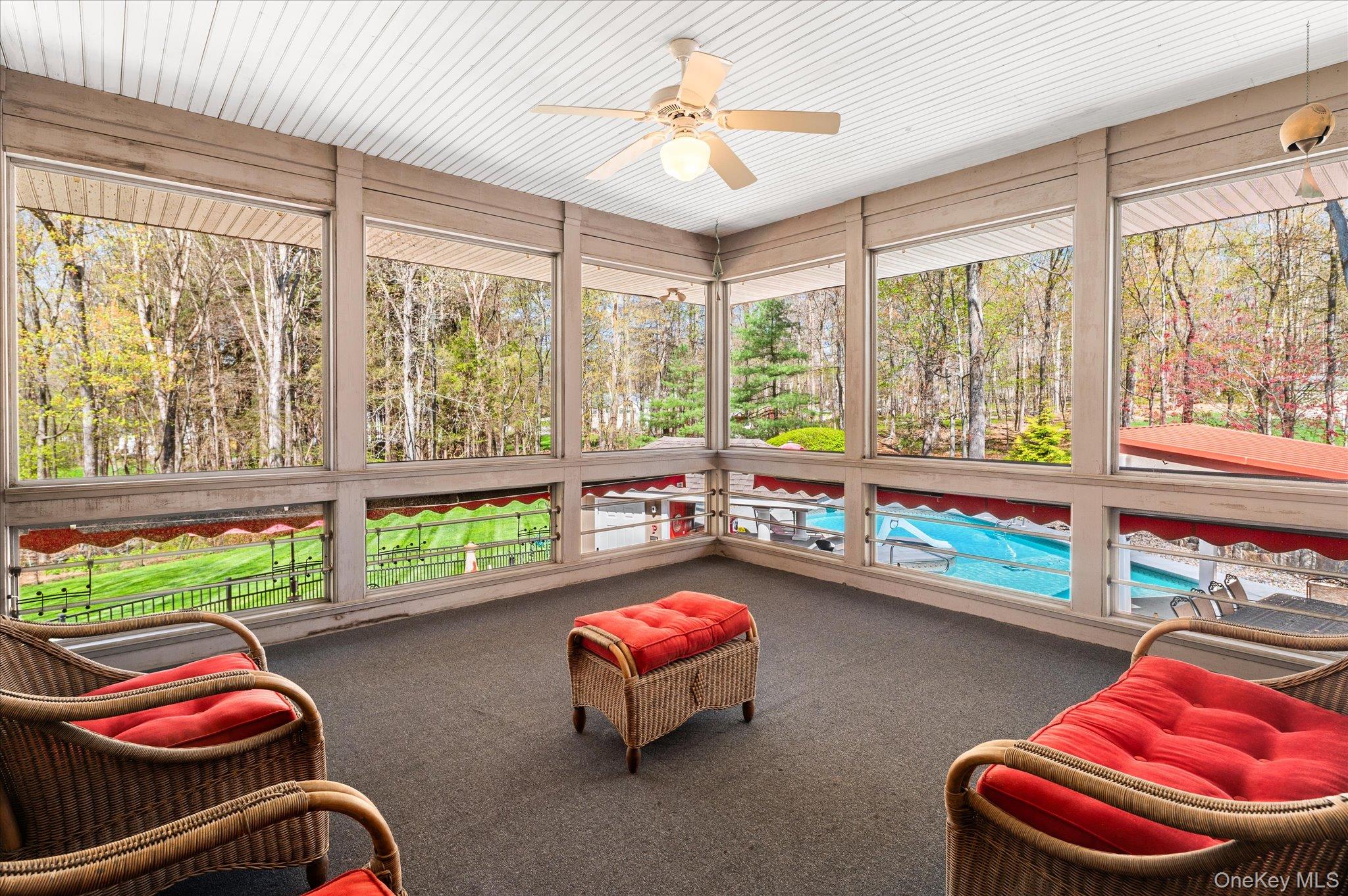 85 Orchard Hill Road Carmel, NY 10512 - Photo 20 of 50 a room with furniture and a floor to ceiling window