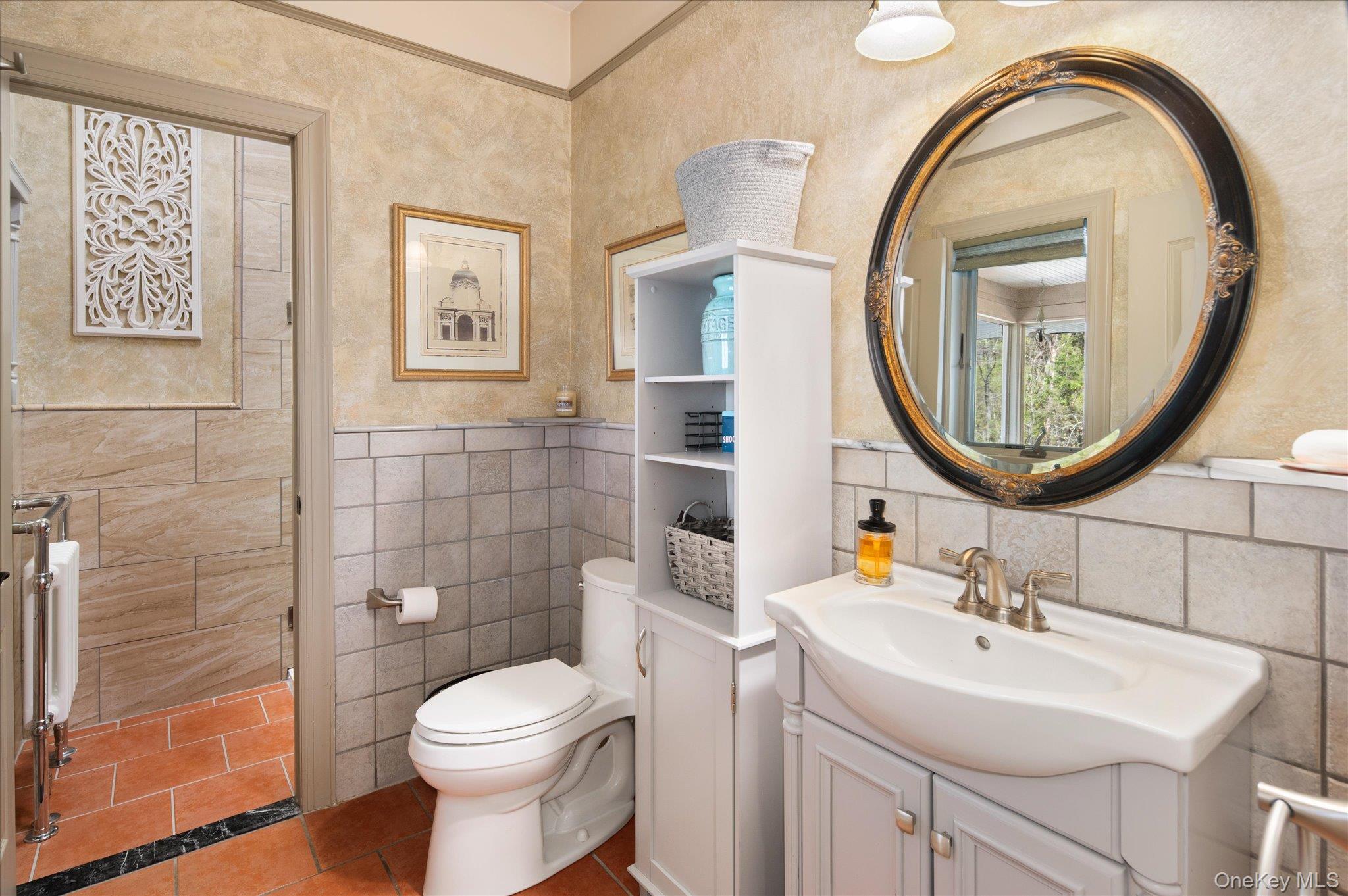 85 Orchard Hill Road Carmel, NY 10512 - Photo 21 of 50 a bathroom with a sink a toilet and a mirror