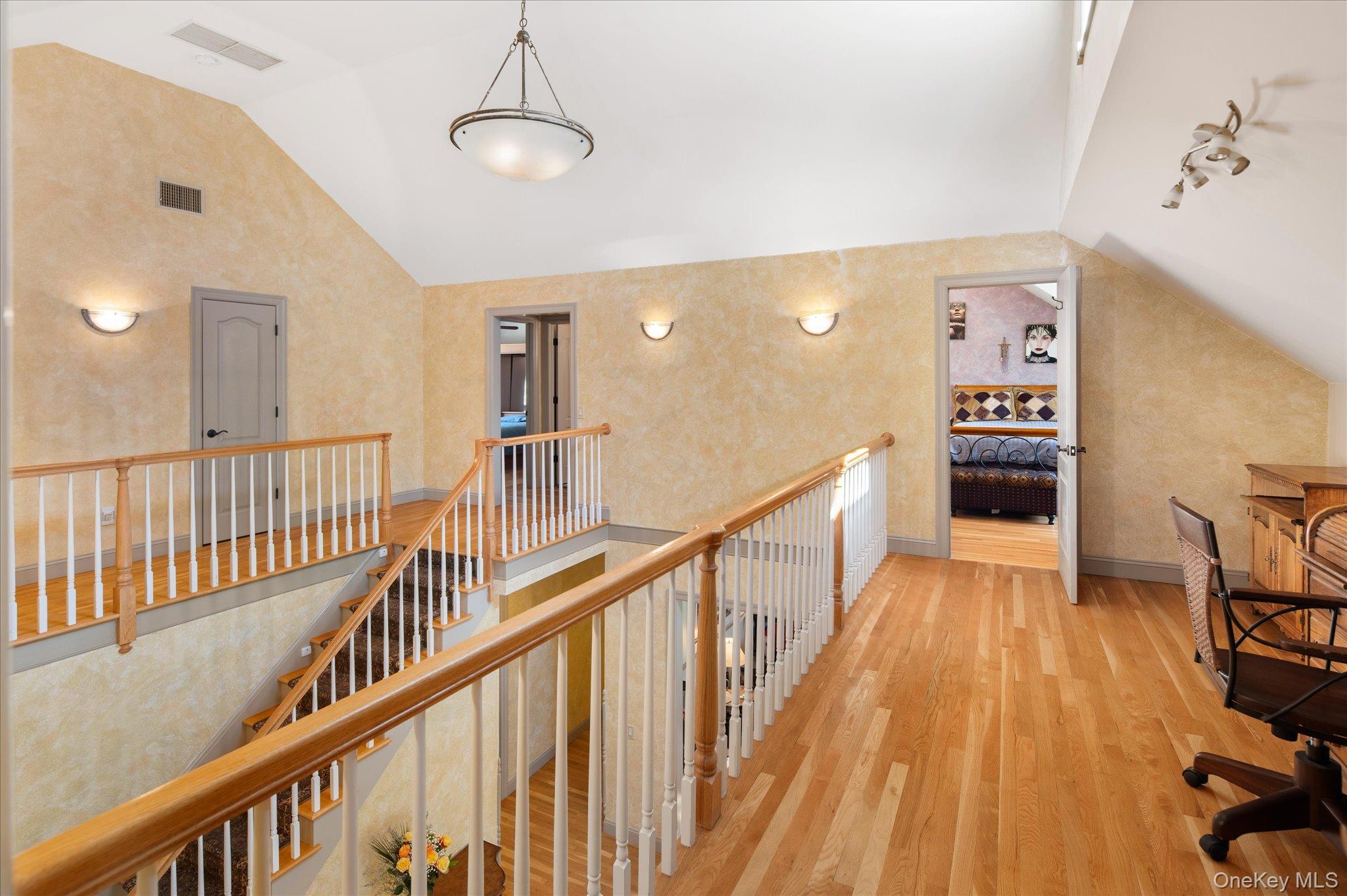 85 Orchard Hill Road Carmel, NY 10512 - Photo 23 of 50 a view of a hallway with wooden floor and staircase