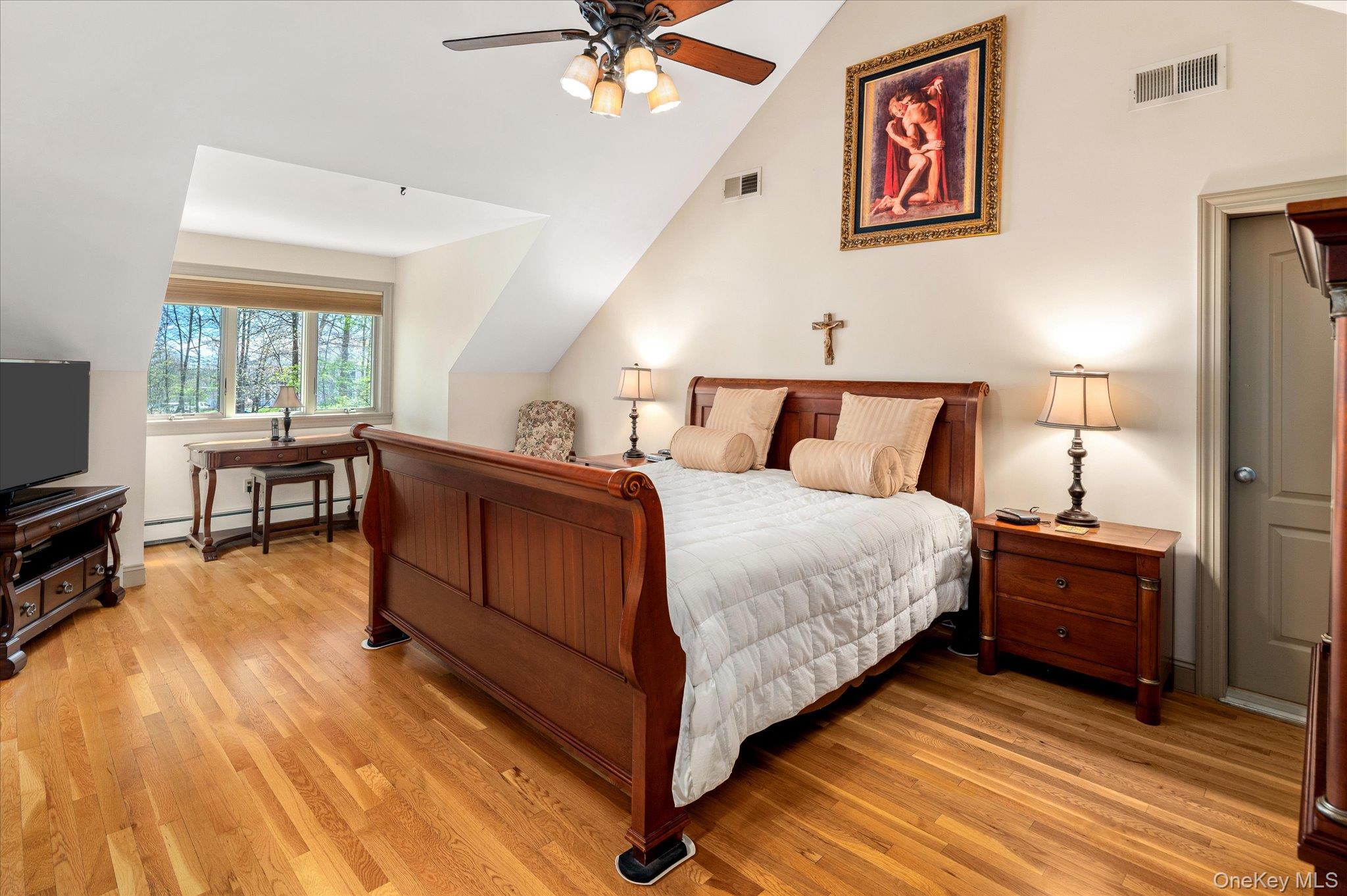 85 Orchard Hill Road Carmel, NY 10512 - Photo 24 of 50 a bed room with a bed and a television