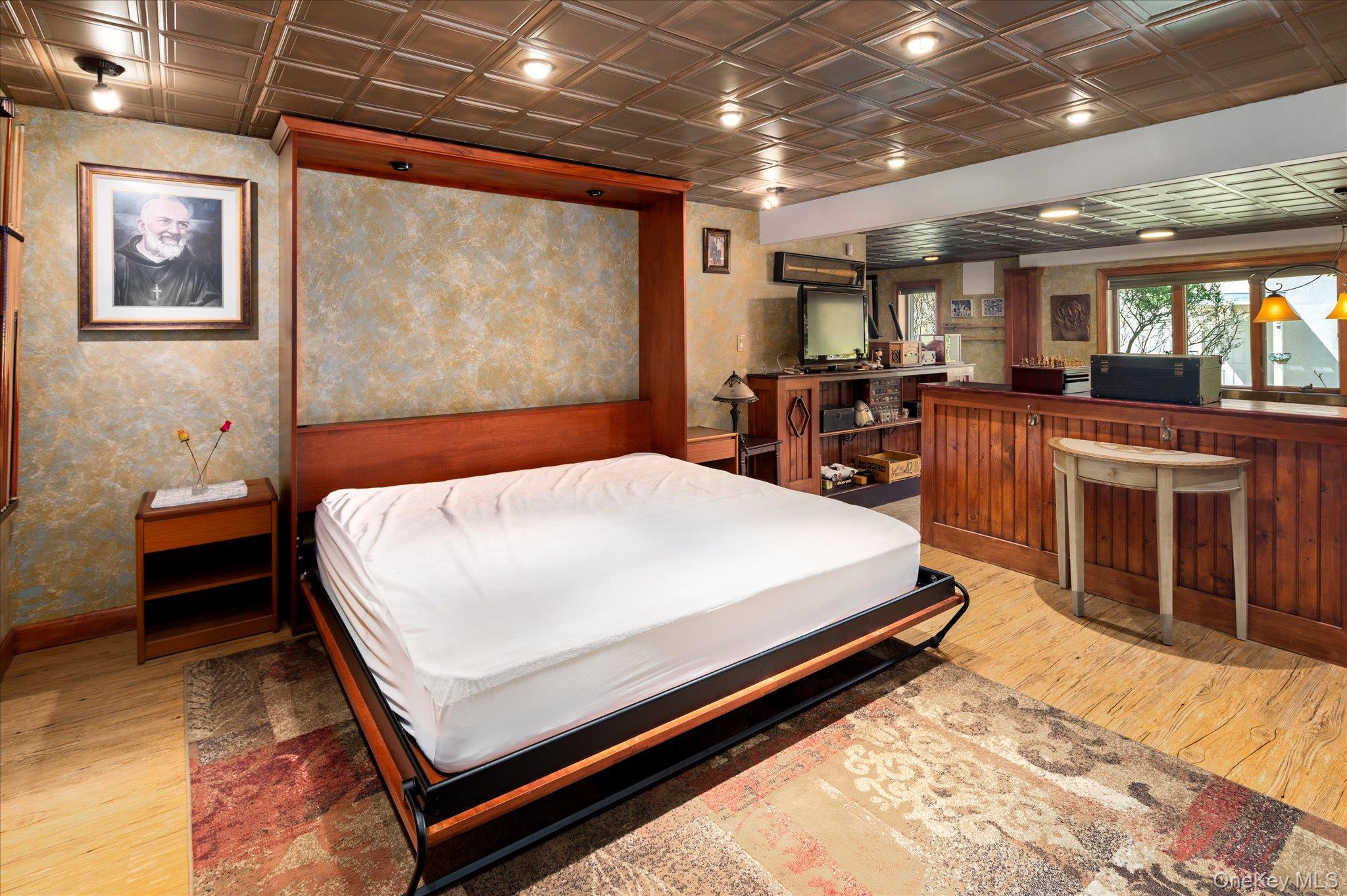 85 Orchard Hill Road Carmel, NY 10512 - Photo 34 of 50 a bed room with a bed and a large with kitchen