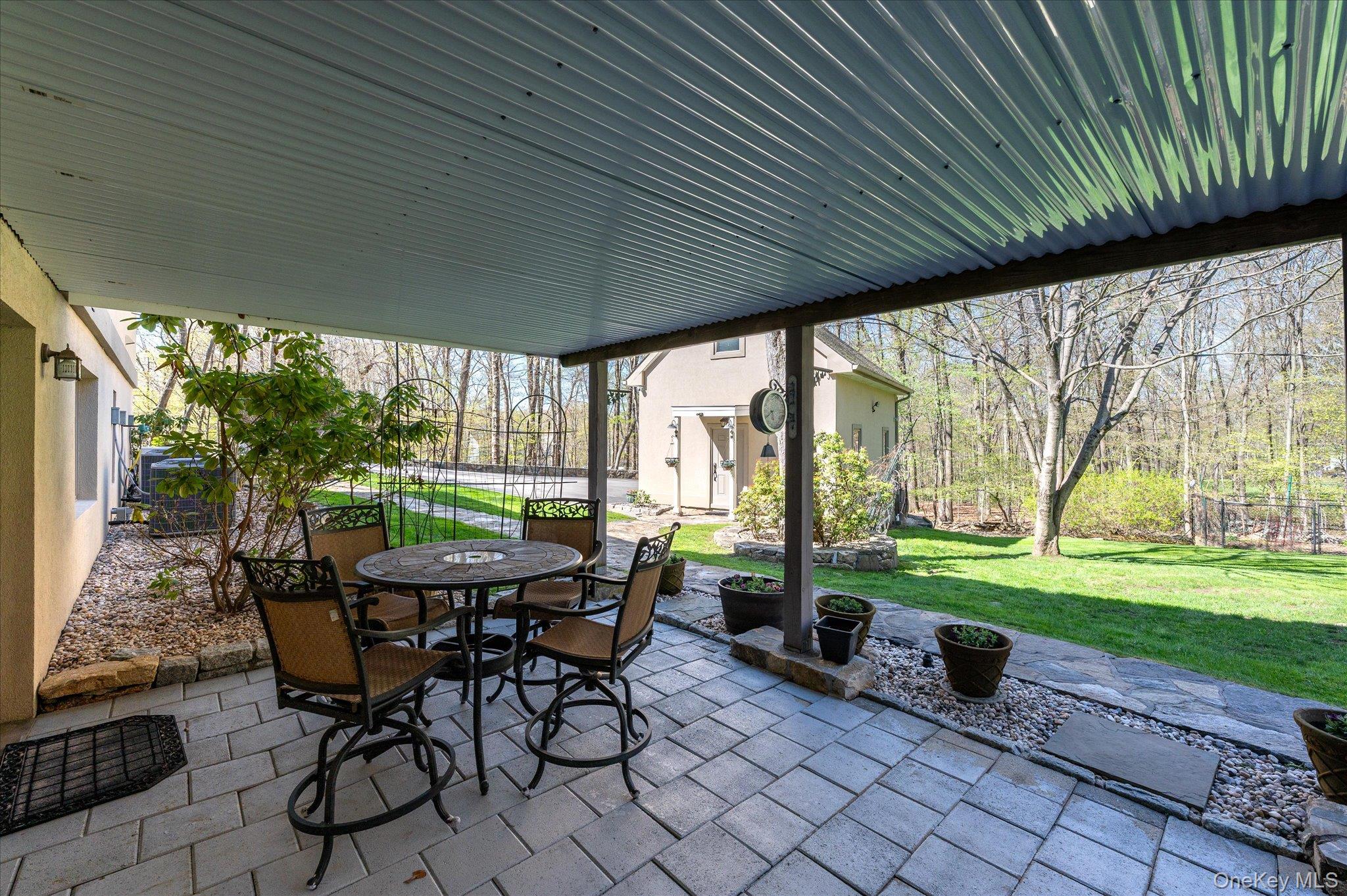 85 Orchard Hill Road Carmel, NY 10512 - Photo 39 of 50 a view of outdoor space with furniture and garden
