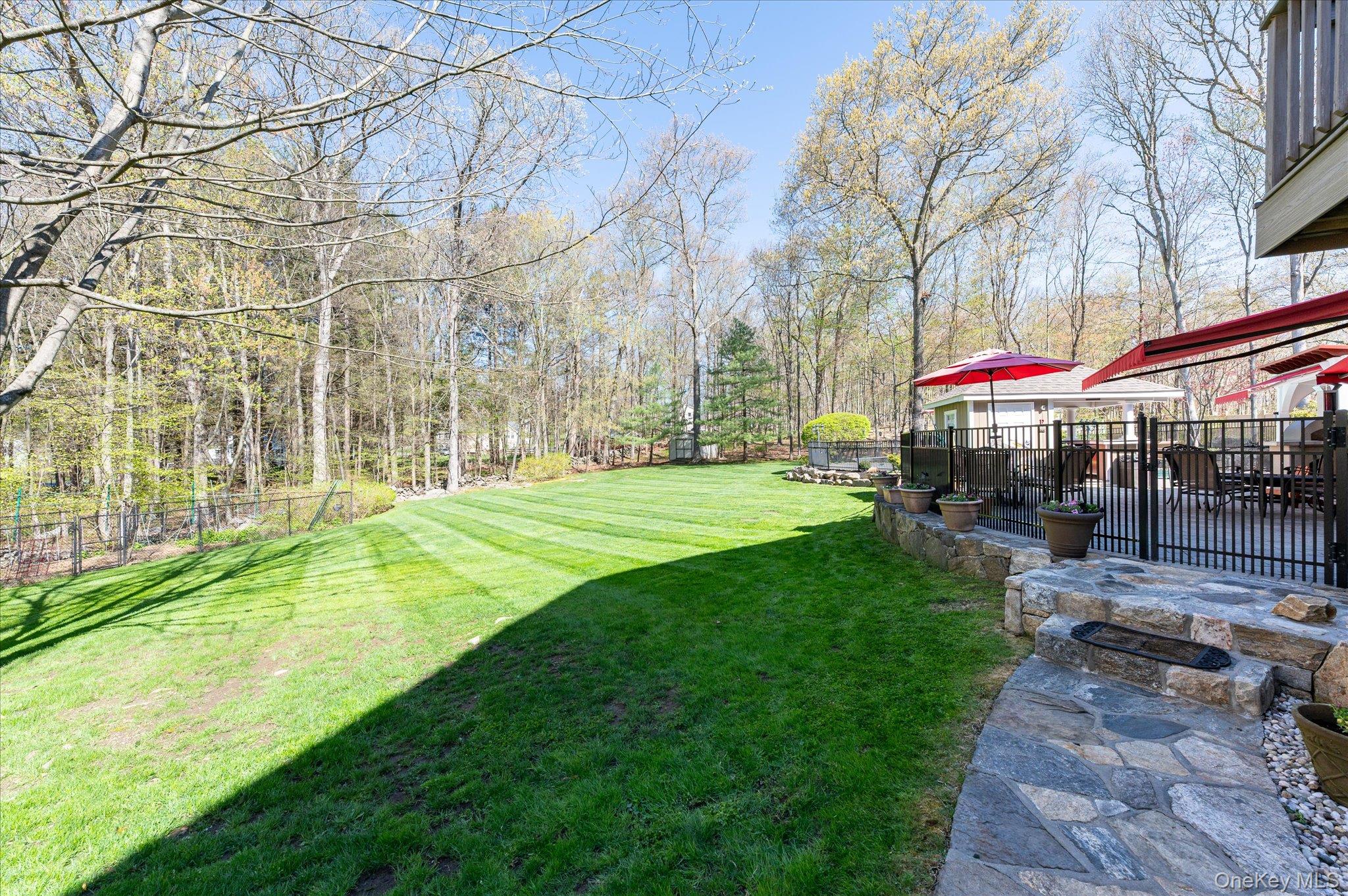 85 Orchard Hill Road Carmel, NY 10512 - Photo 46 of 50 a view of a building with a yard