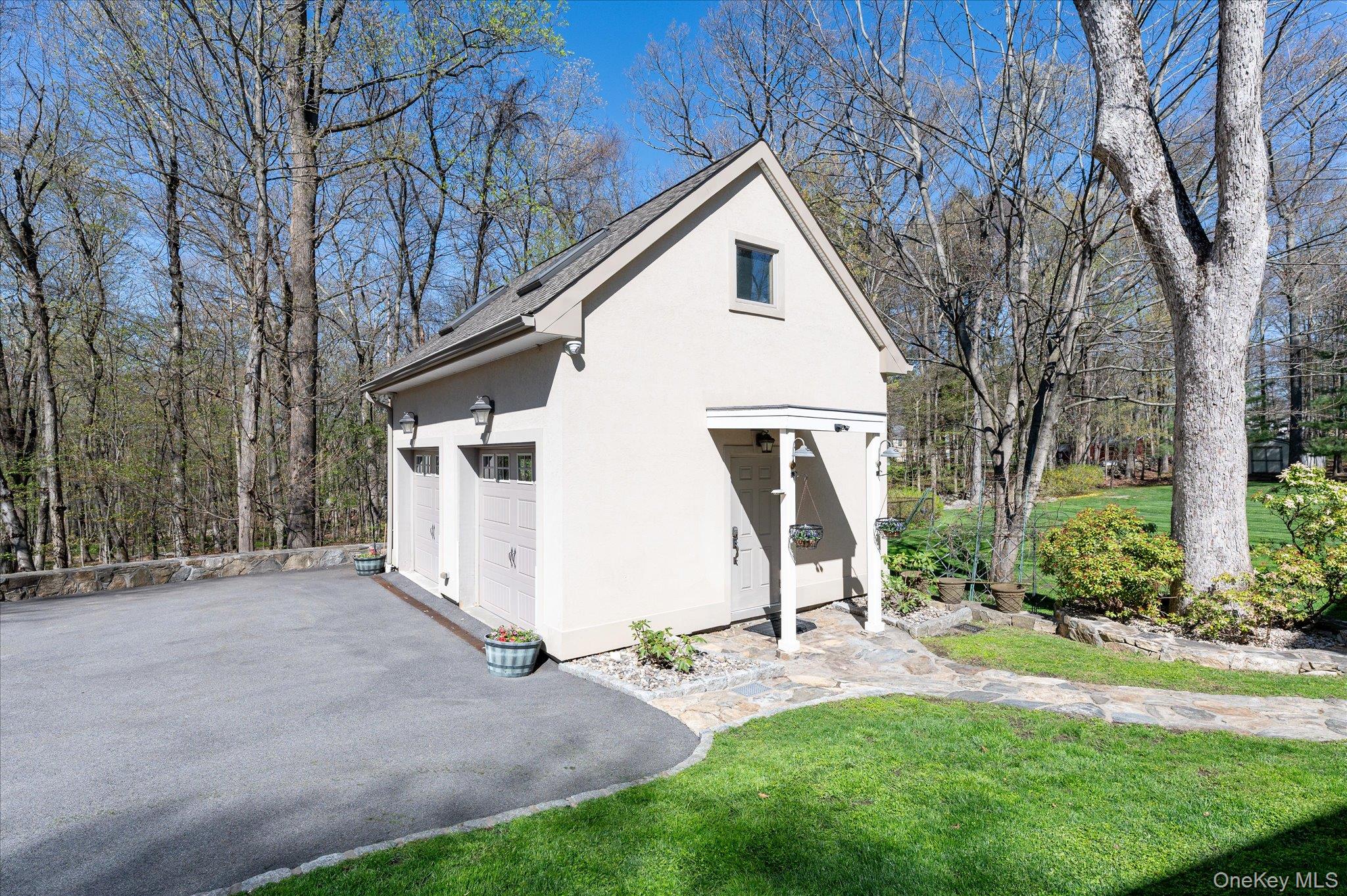 85 Orchard Hill Road Carmel, NY 10512 - Photo 48 of 50 a view of a house with backyard and a tree