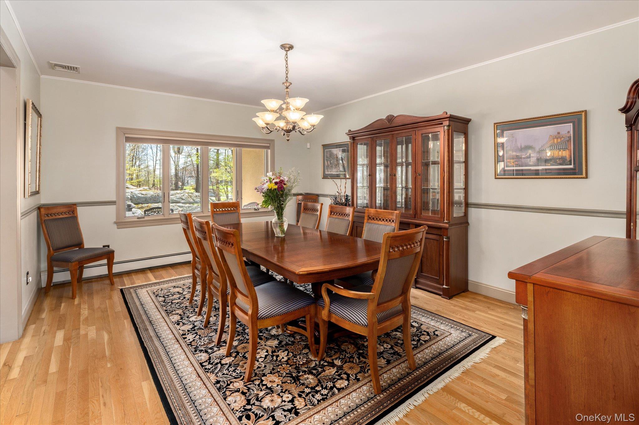 85 Orchard Hill Road Carmel, NY 10512 - Photo 8 of 50 a view of a dining room with furniture window and wooden floor