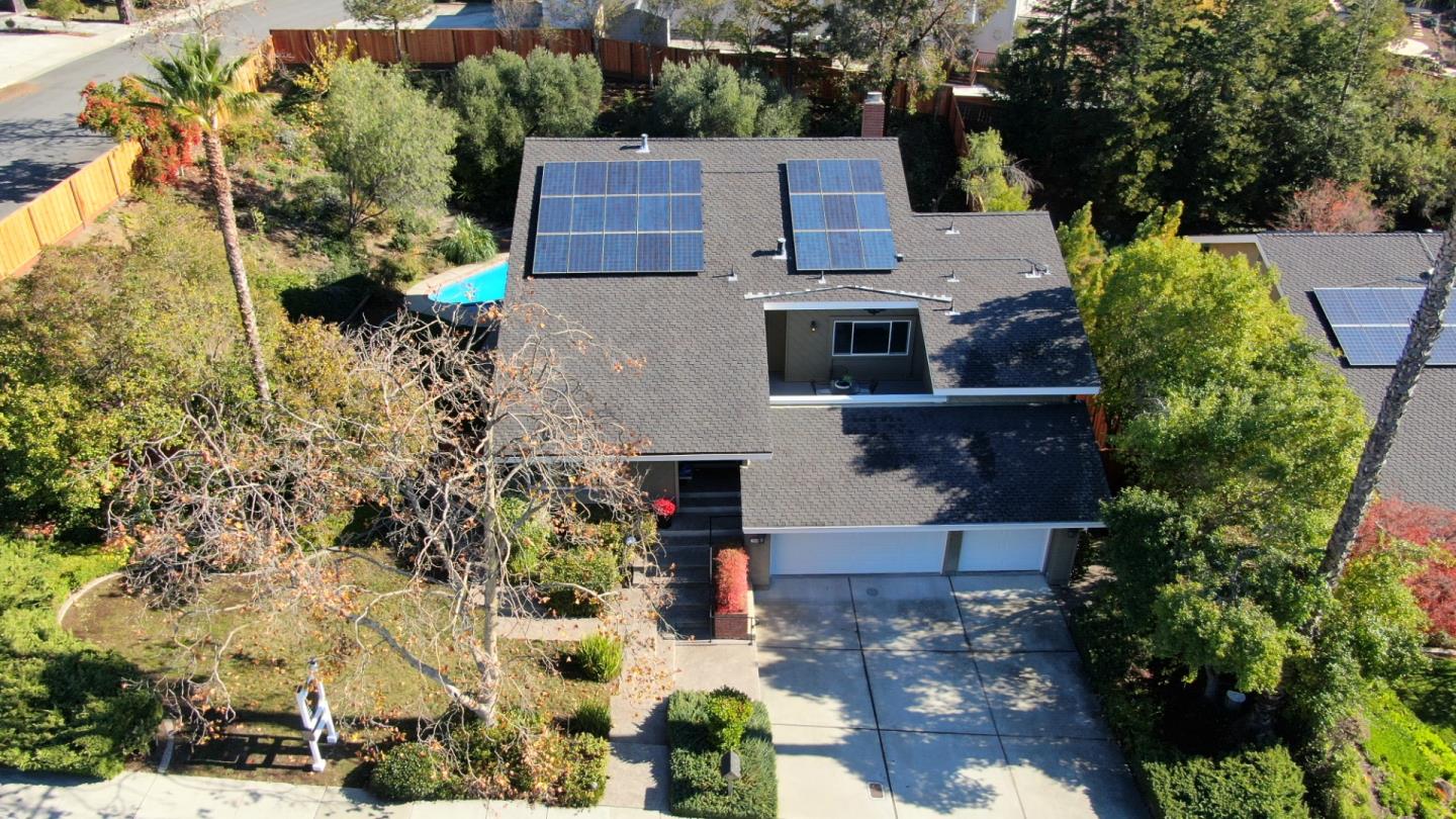 7054 Morecambe Drive San Jose, CA 95120 - Photo 12 of 50 an aerial view of a house with a yard and garden
