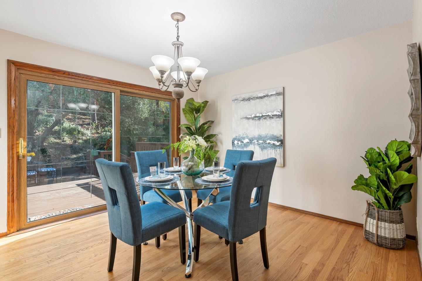 7054 Morecambe Drive San Jose, CA 95120 - Photo 17 of 50 a view of a dining room with furniture window and wooden floor