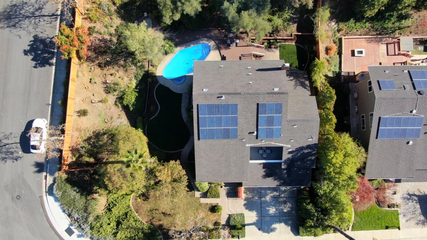 7054 Morecambe Drive San Jose, CA 95120 - Photo 26 of 50 an aerial view of a house with a yard and garden