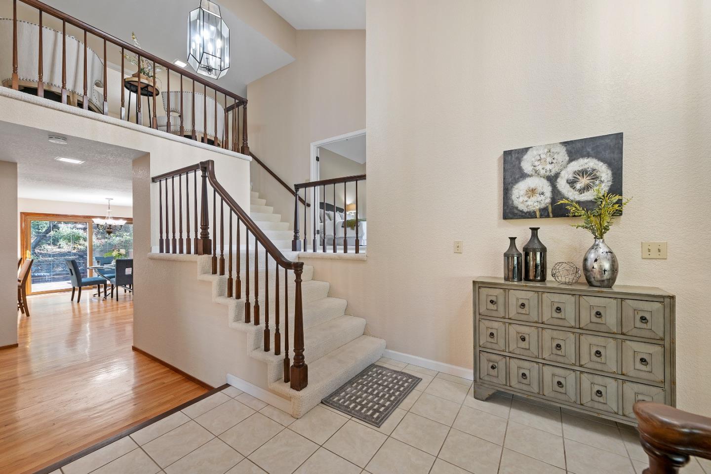 7054 Morecambe Drive San Jose, CA 95120 - Photo 27 of 50 a view of entryway with wooden floor