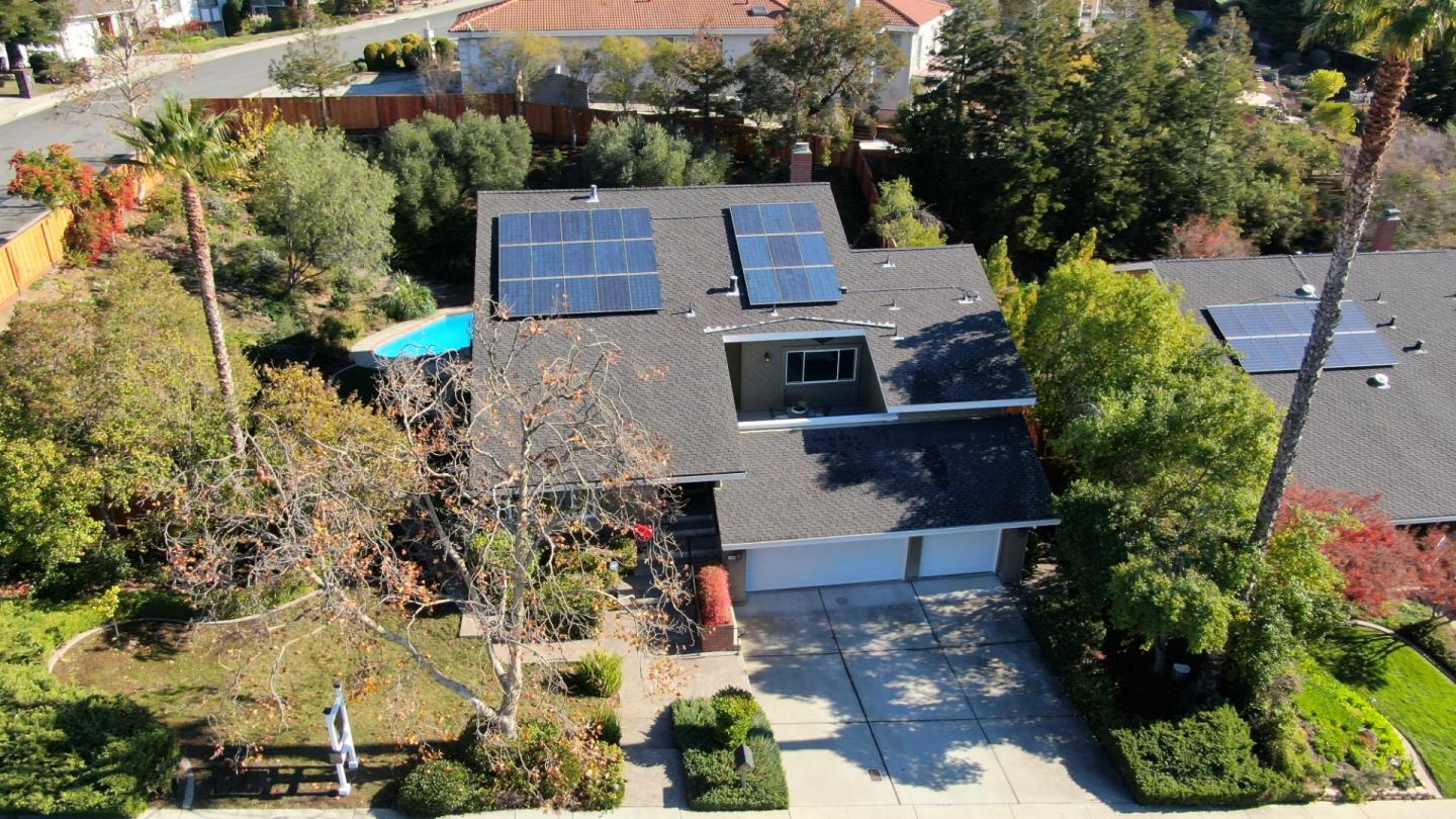 7054 Morecambe Drive San Jose, CA 95120 - Photo 29 of 50 an aerial view of a house with a yard and garden