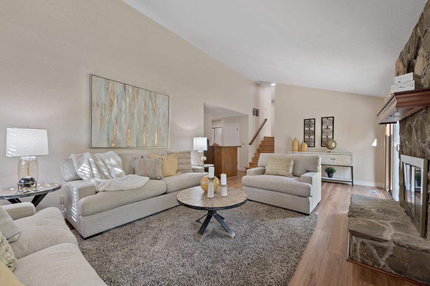 7054 Morecambe Drive San Jose, CA 95120 - Photo 30 of 50 a living room with furniture and a lamp