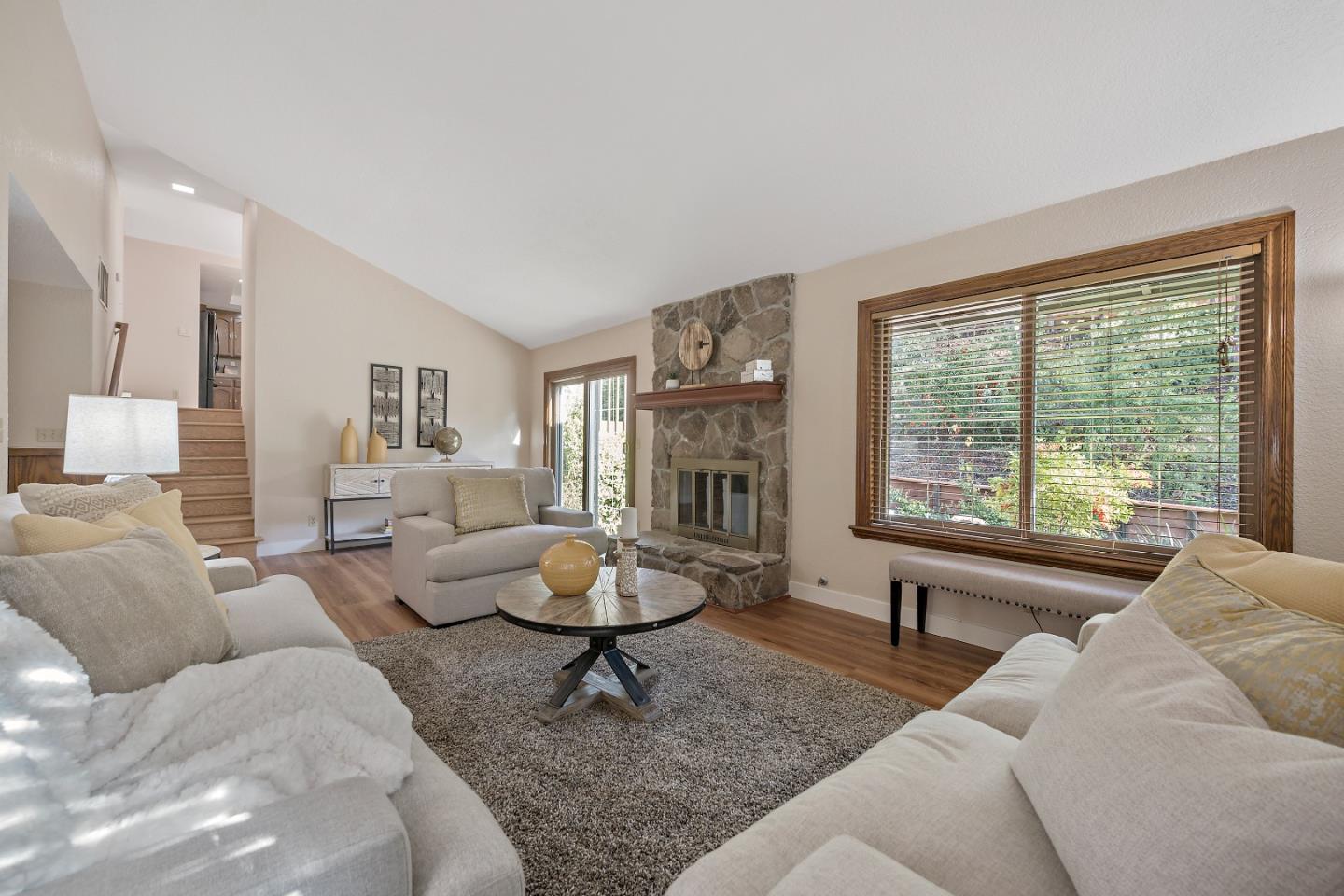 7054 Morecambe Drive San Jose, CA 95120 - Photo 34 of 50 a living room with furniture and a large window