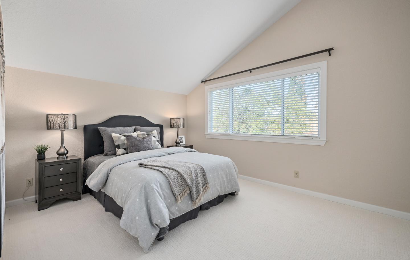 7054 Morecambe Drive San Jose, CA 95120 - Photo 39 of 50 a bedroom with a bed and a window