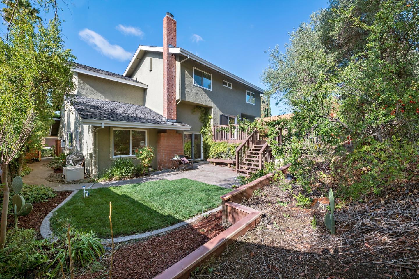 7054 Morecambe Drive San Jose, CA 95120 - Photo 40 of 50 a front view of a house with garden