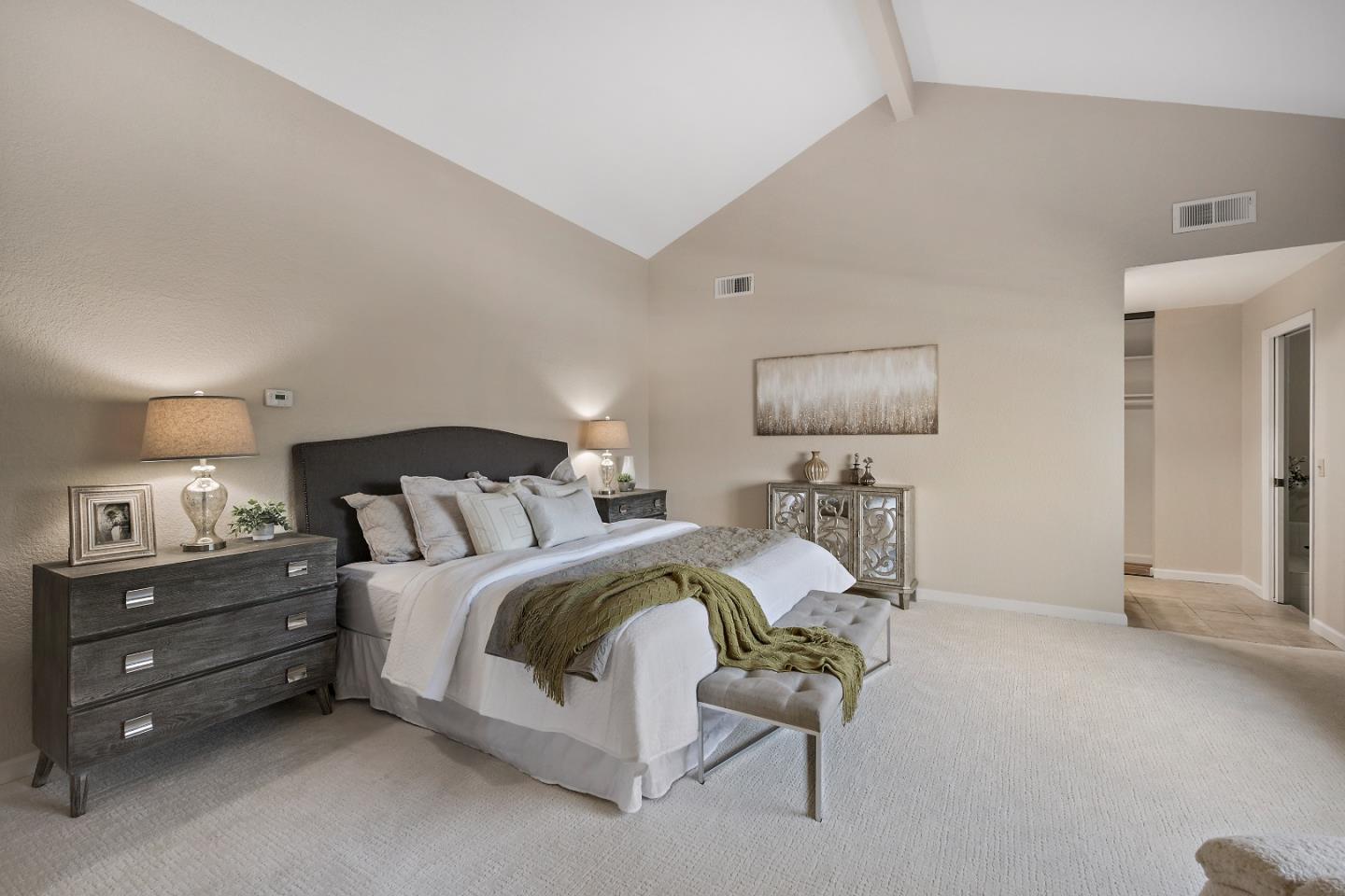 7054 Morecambe Drive San Jose, CA 95120 - Photo 45 of 50 a bedroom with a bed and a chair