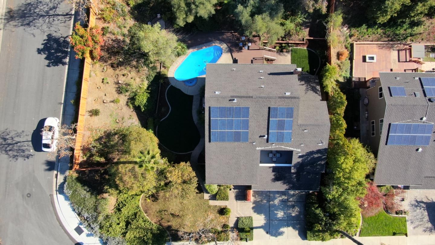7054 Morecambe Drive San Jose, CA 95120 - Photo 46 of 50 an aerial view of a house with a yard swimming pool