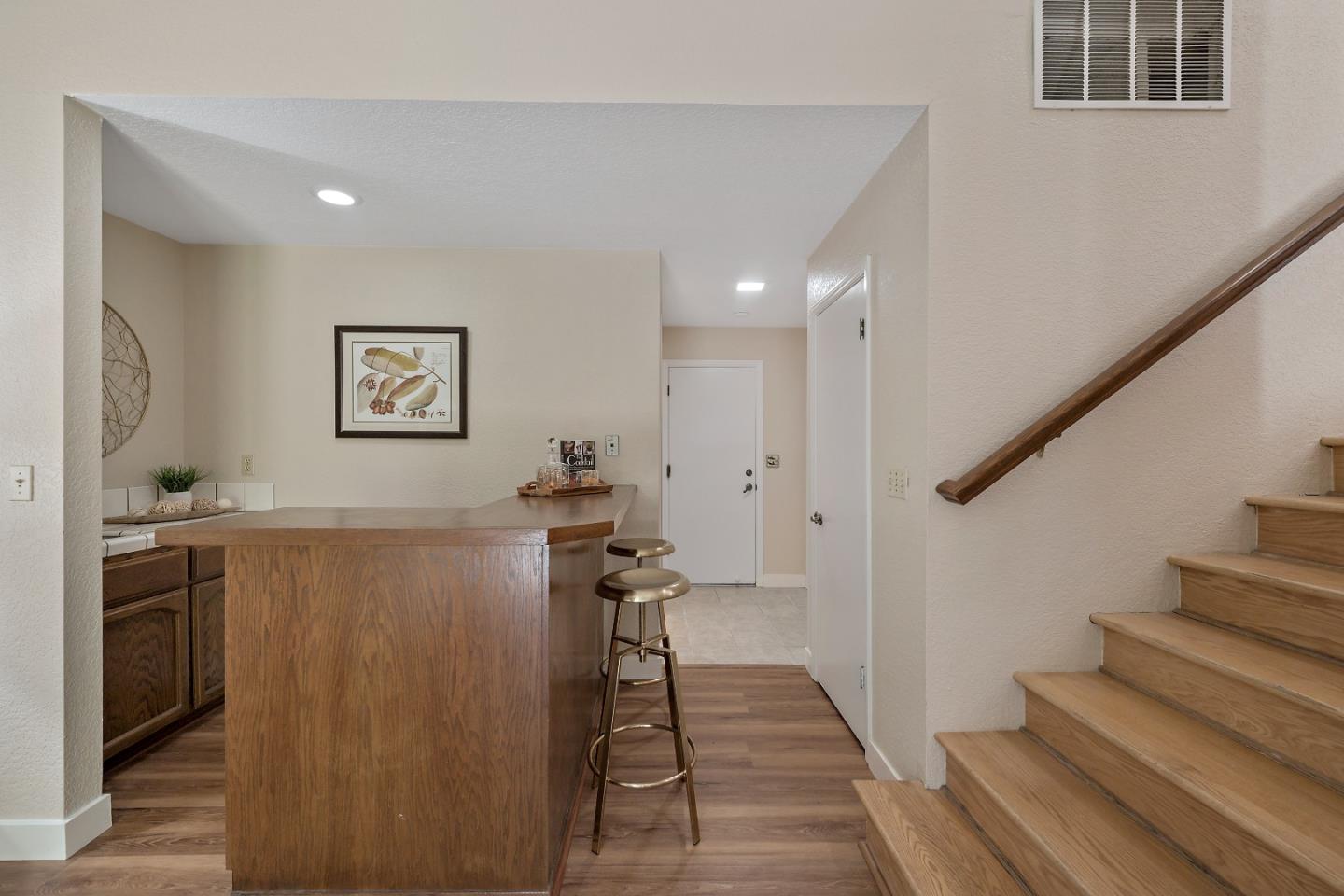 7054 Morecambe Drive San Jose, CA 95120 - Photo 6 of 50 a view of a hallway with seating area