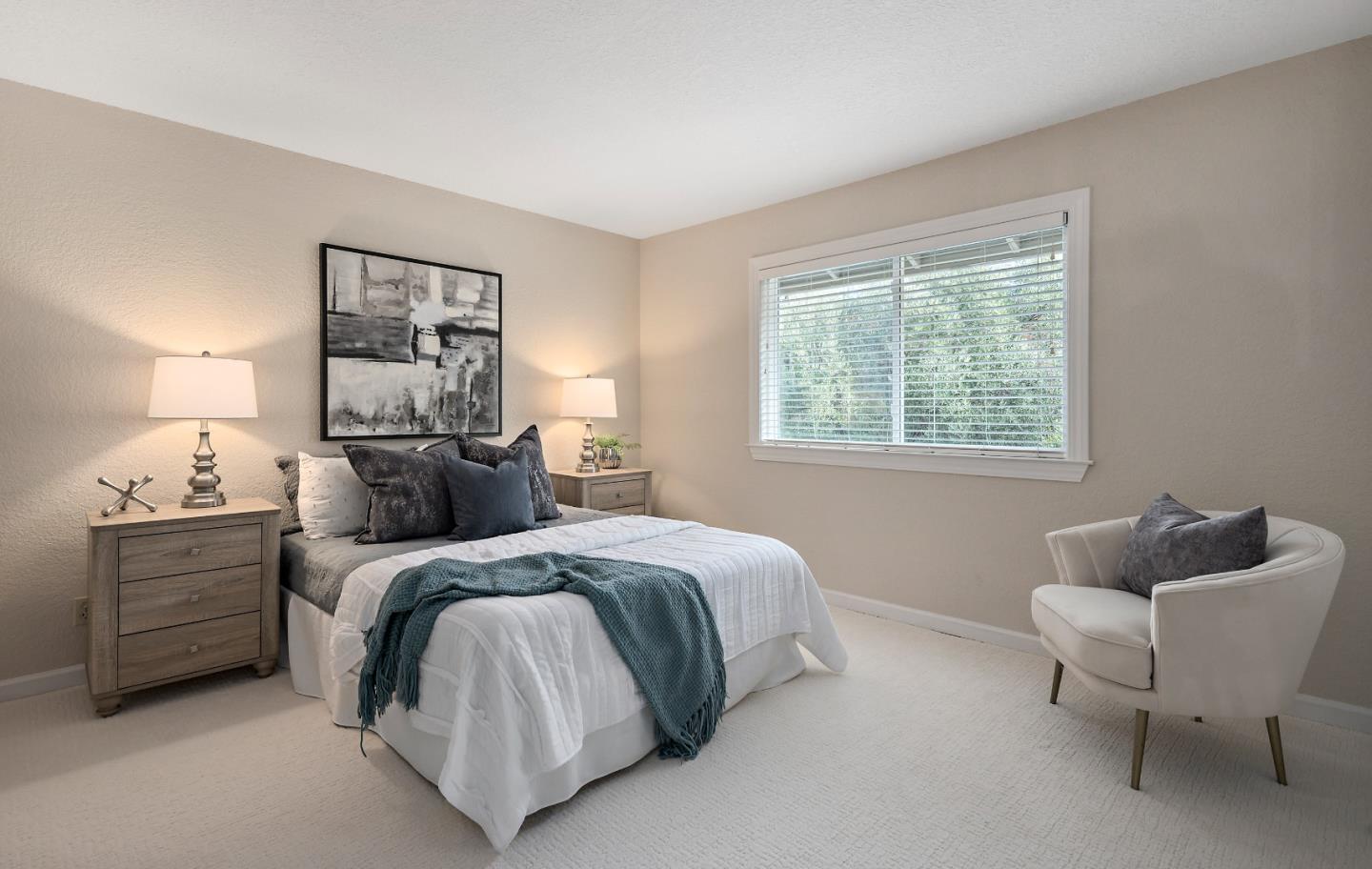 7054 Morecambe Drive San Jose, CA 95120 - Photo 8 of 50 a bedroom with a bed and a couch