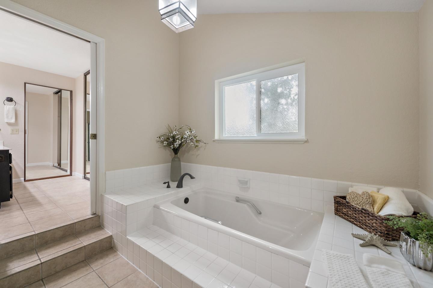7054 Morecambe Drive San Jose, CA 95120 - Photo 10 of 50 a white bath tub sitting next to a white sink