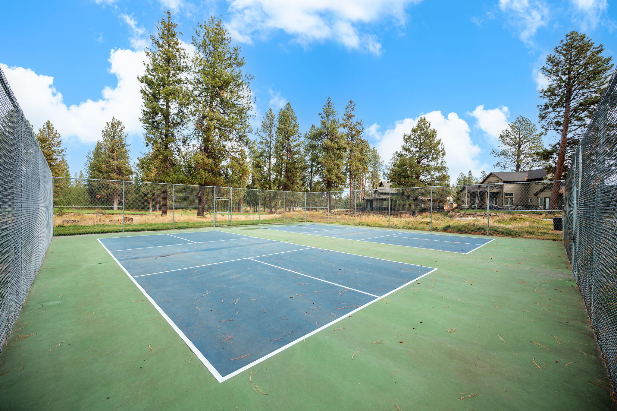 18575 Southwest Century Drive, Unit 232 Bend, OR 97702 - Photo 22 of 37 a view of a tennis court