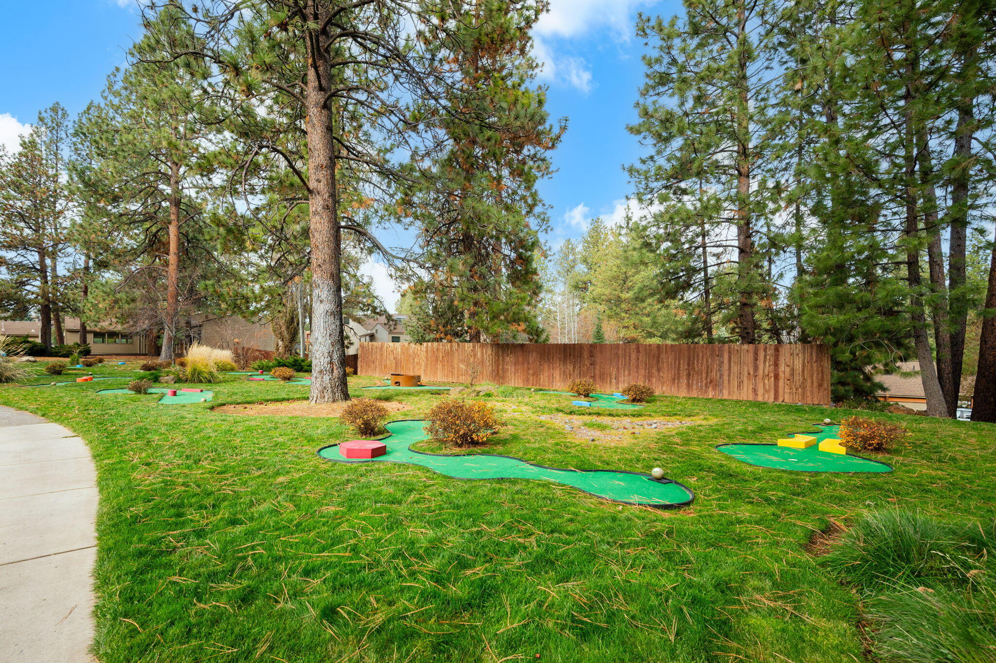 18575 Southwest Century Drive, Unit 232 Bend, OR 97702 - Photo 27 of 37 a yard with lots of green space and trees