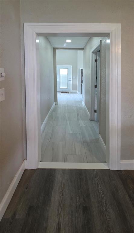 13330 Fort King Road Dade City, FL 33525 - Photo 13 of 43 wooden floor in an empty room