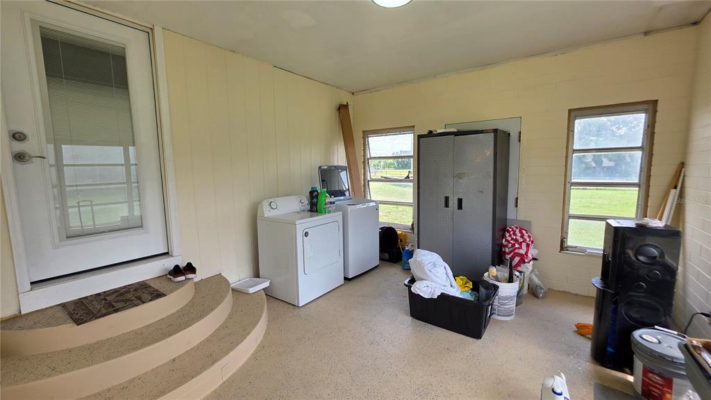 13330 Fort King Road Dade City, FL 33525 - Photo 24 of 43 a living room with furniture and wooden floor