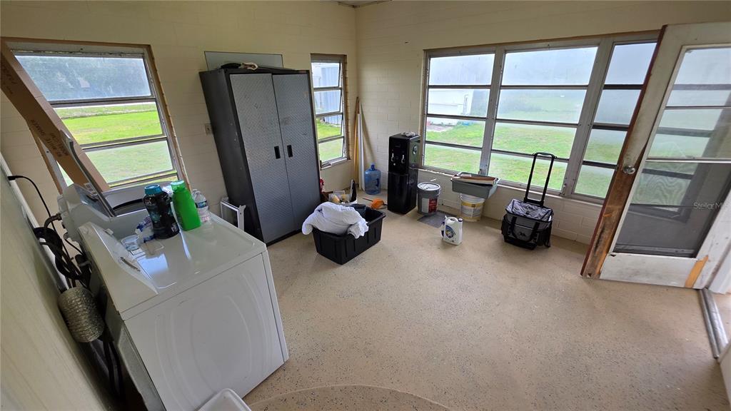 13330 Fort King Road Dade City, FL 33525 - Photo 25 of 43 a room with furniture and a large window