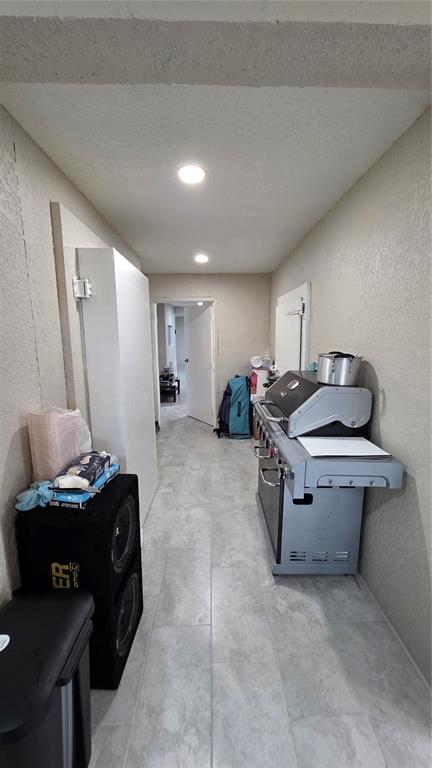 13330 Fort King Road Dade City, FL 33525 - Photo 31 of 43 a room with a table chairs and a flat screen tv