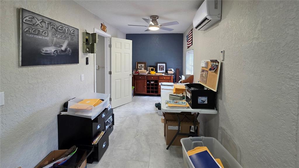 13330 Fort King Road Dade City, FL 33525 - Photo 32 of 43 a view of a workspace with furniture and gym equipment