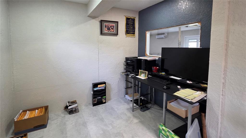 13330 Fort King Road Dade City, FL 33525 - Photo 33 of 43 a view of workspace with a flat screen tv