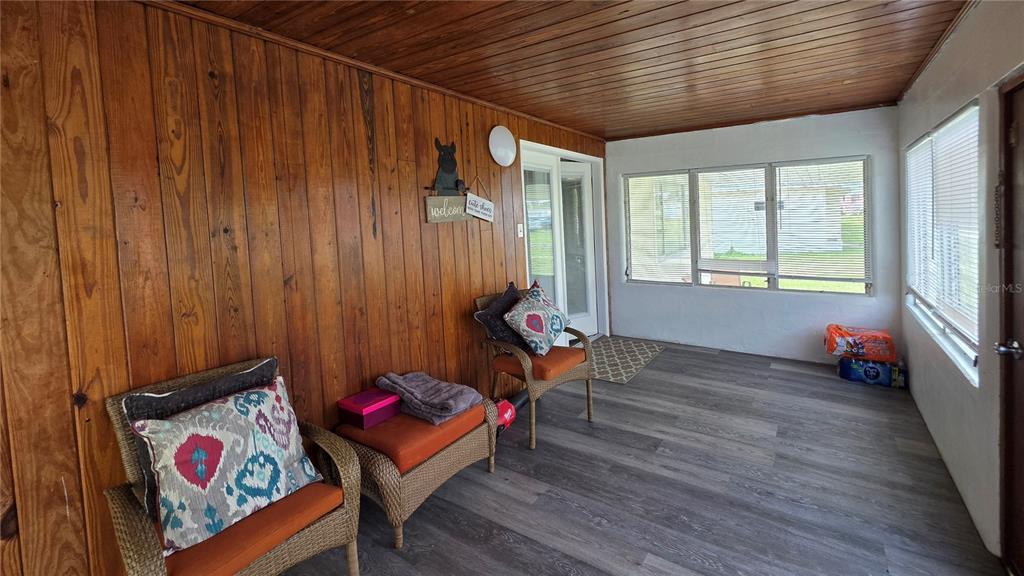 13330 Fort King Road Dade City, FL 33525 - Photo 4 of 43 a living room with furniture and a gate