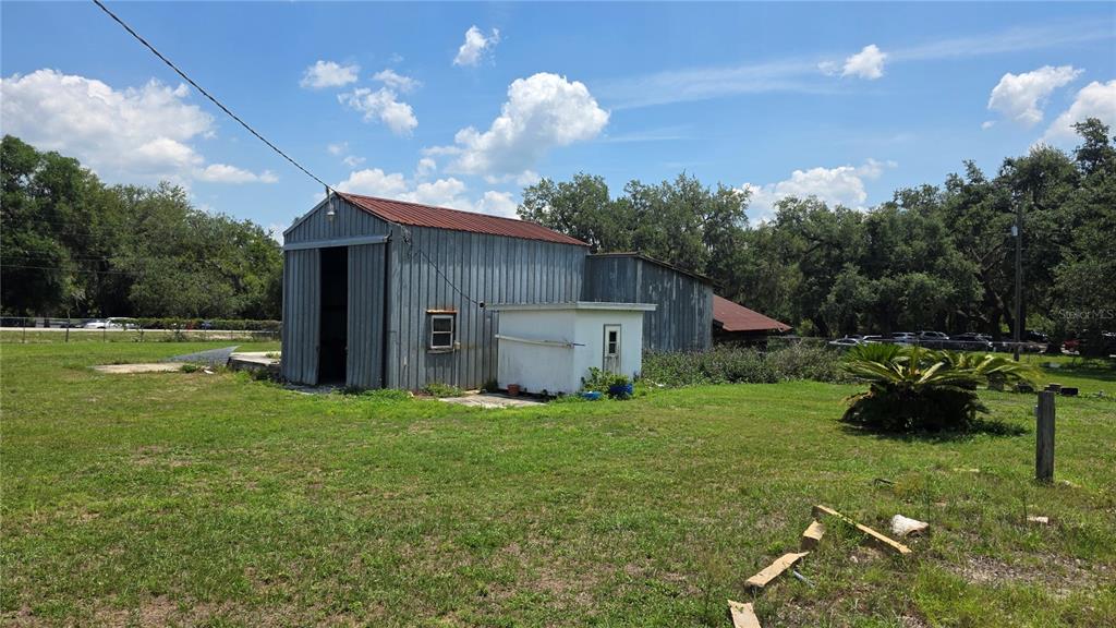 13330 Fort King Road Dade City, FL 33525 - Photo 42 of 43 a house view with a garden space