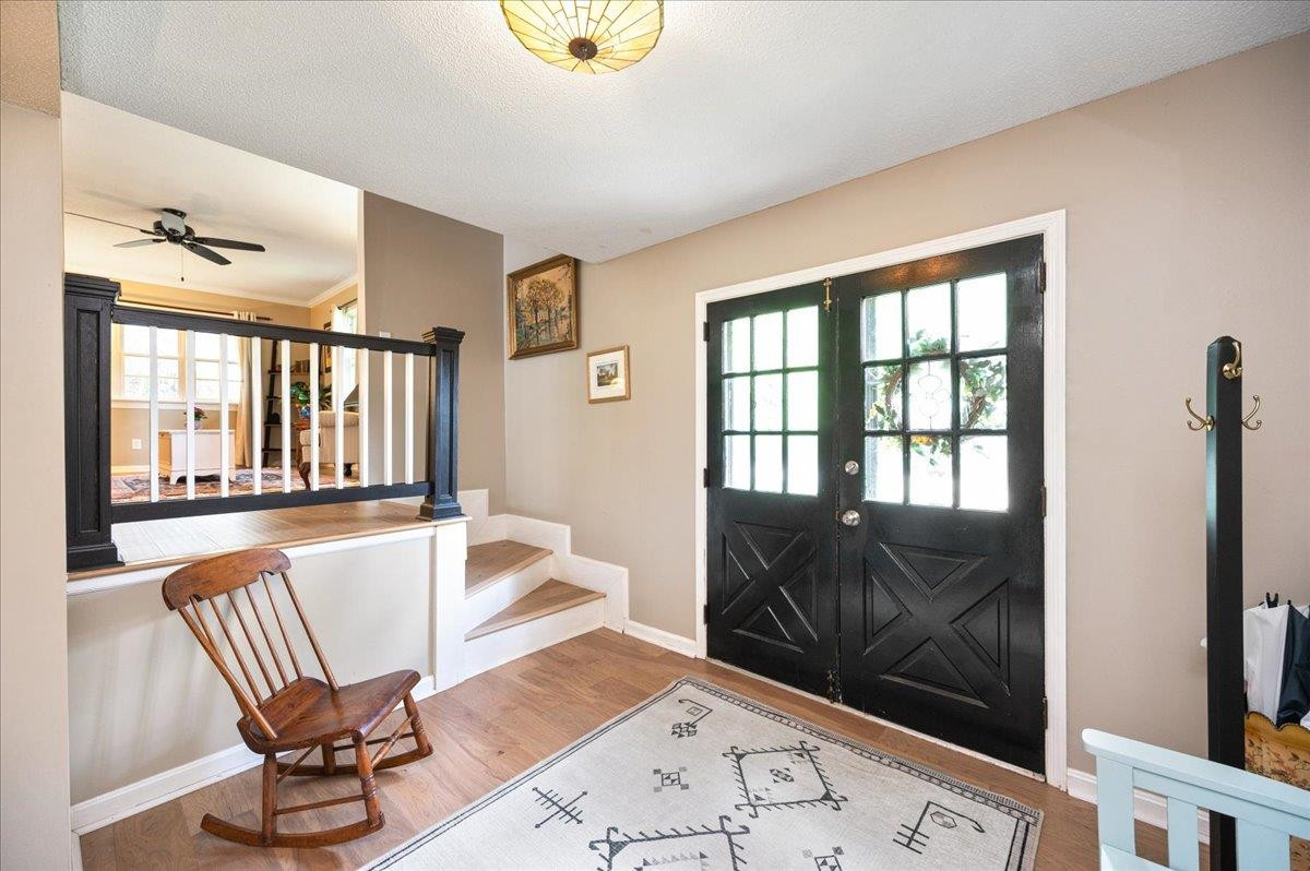 7709 Fiesta Way Raleigh, NC 27615 - Photo 2 of 25 Large open foyer with double door