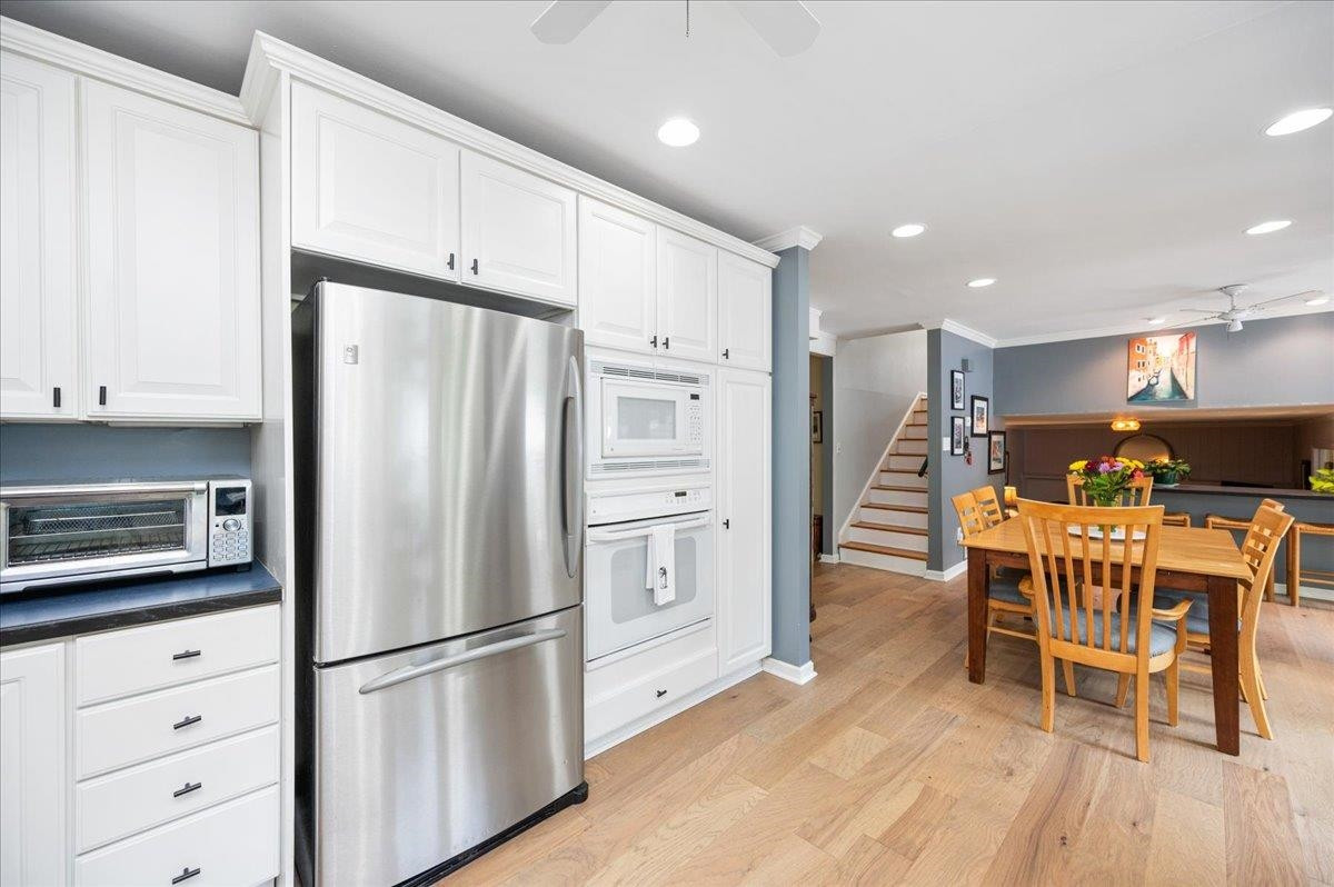 7709 Fiesta Way Raleigh, NC 27615 - Photo 7 of 25 Open kitchen to dining