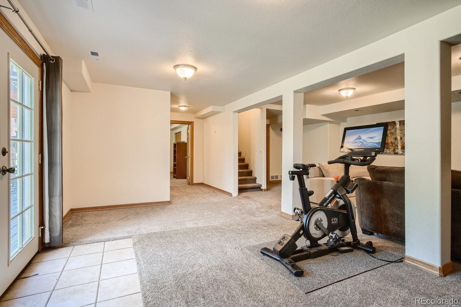 731 Hitchrack Road Bailey, CO 80421 - Photo 21 of 22 a view of a room with gym equipment